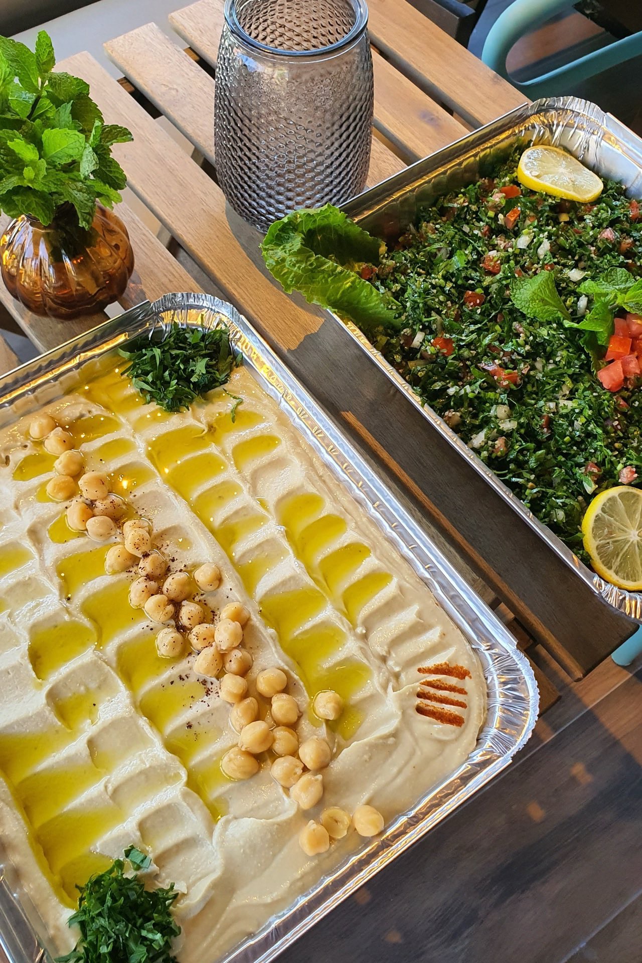 A shared Mediterranean spread of mezze and grilled dishes at Mezzé #1